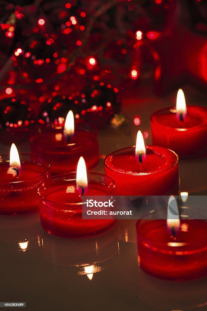 red burning candles six red burning lights in background christmas - lights Burning Stock Photo