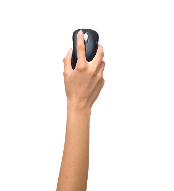 Computer mouse in human hand on white background stock photo