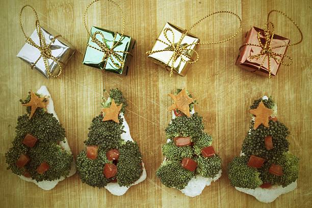 istock Christmas tree of bread  broccoli and tomatoes 454288427