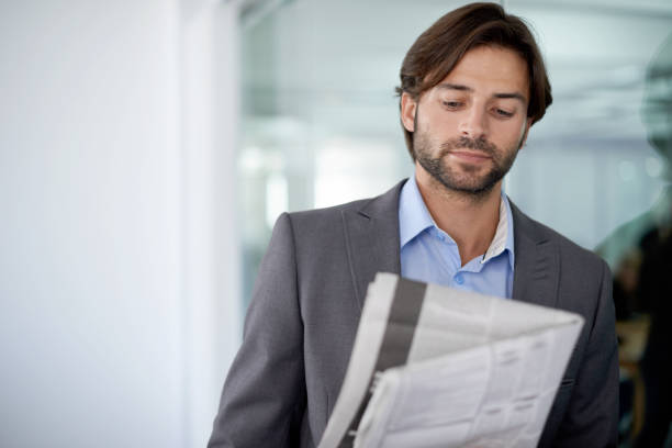 istock Engrossed in the business section 454301555