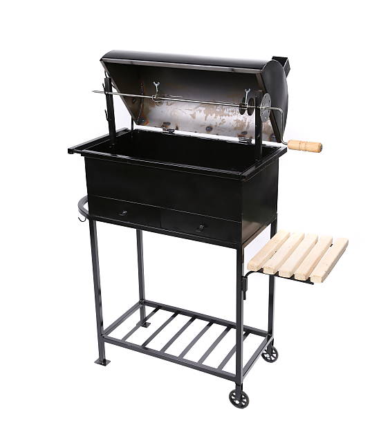 istock new black barbecue with a cover over 454306393
