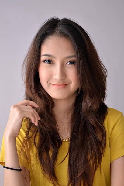 Young Beautiful Asian Woman Smiling