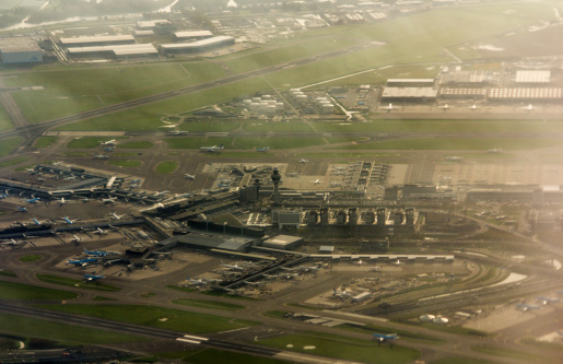 Schiphol Airport from above. With planes landing and taking off.