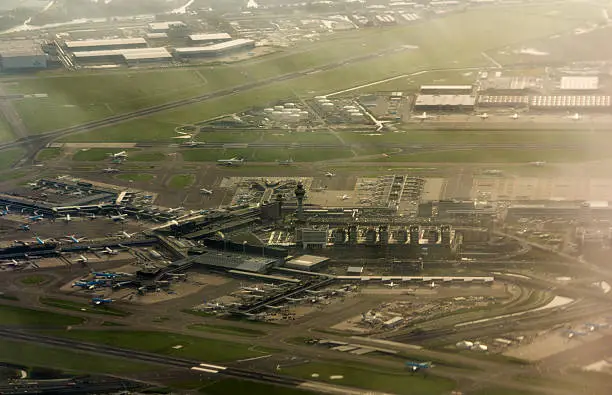 Schiphol Airport from above. With planes landing and taking off.