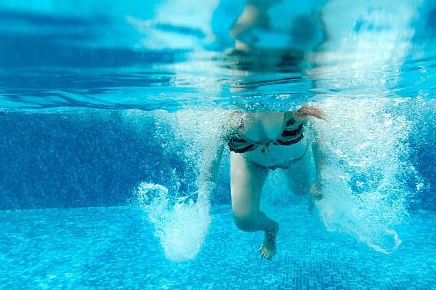 istock woman swimming 454313975