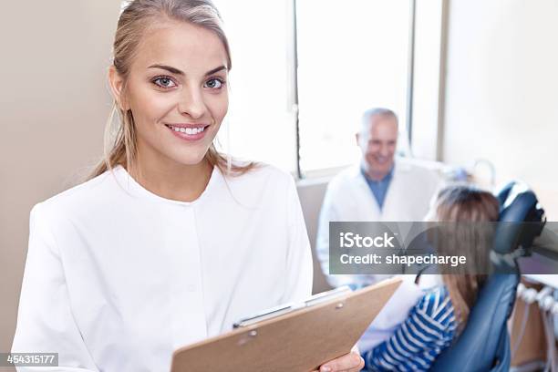 Does Your Medical Insurance Cover Dentistry Stock Photo - Download Image Now - Adult, Assistance, Assistant