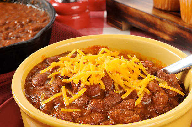 istock Bowl of chili with cheddar cheese 454315631