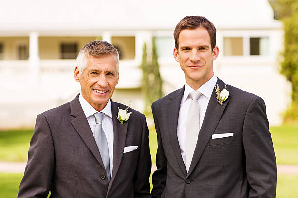 istock Father And Groom Standing In Garden 454316845