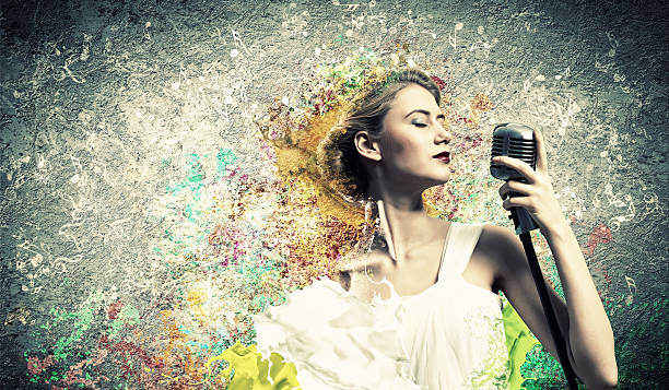 istock Female blonde singer 454317041