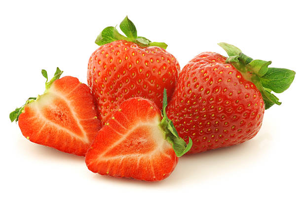 istock fresh strawberries and a cut one 454317235