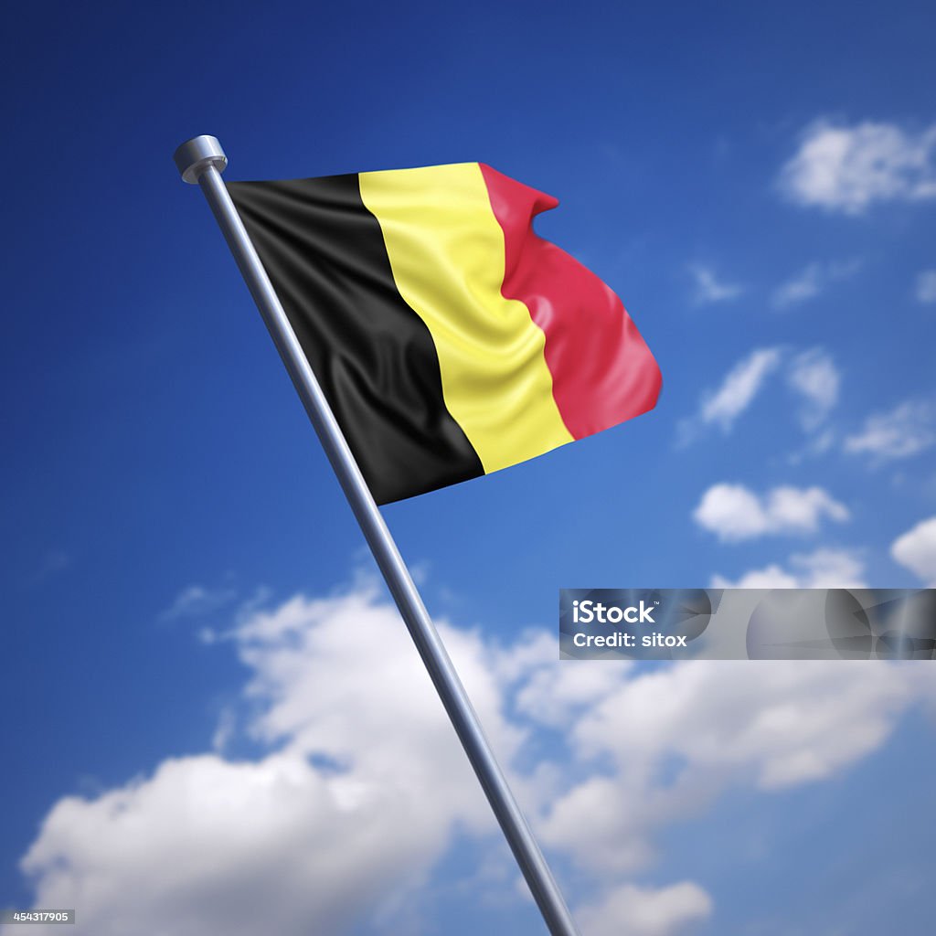 Flag of Belgium against blue sky Flag of the Kingdom of Belgium on modern metal flagpole. Shallow depth of field and motion blur 3d render. Belgian Culture Stock Photo