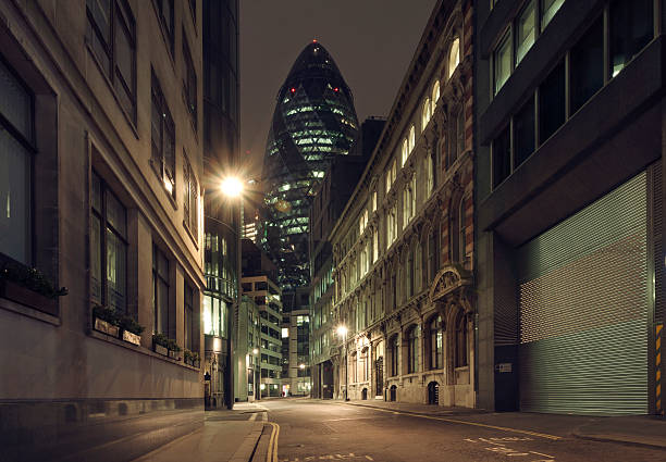 Gherkin building at night The Gherkin building in London at night london gherkin at night stock pictures, royalty-free photos & images