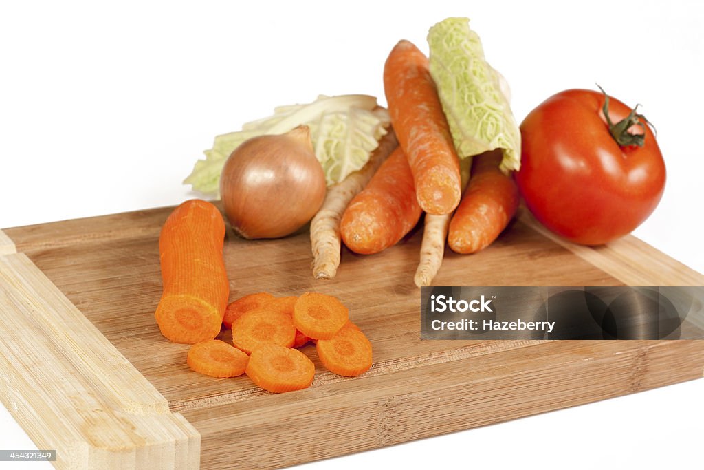 Vegetables composition Vegetables on cutting board isolated on white background Carrot Stock Photo