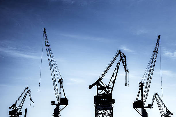 istock Huge Cranes in the industrial port 454321433