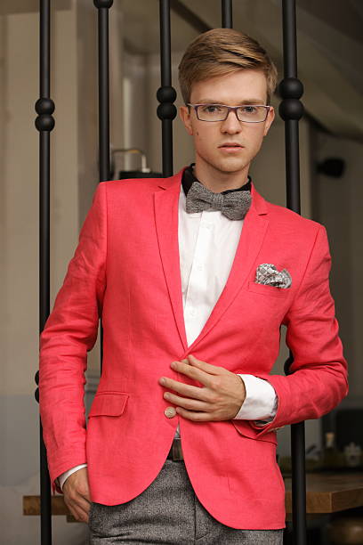 istock Young handsome stylish man posing indoor 454322845