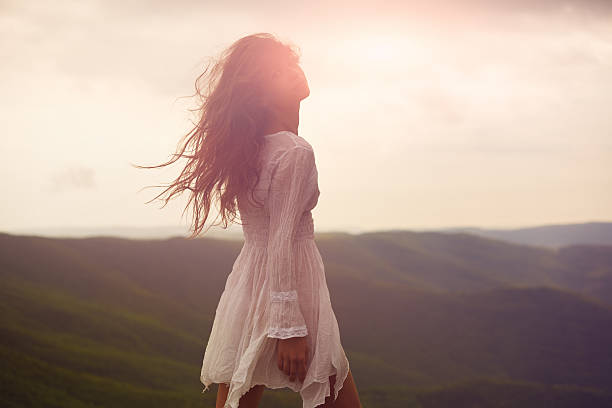Side View Of Woman With Long Hair Blowing In Wind Stock Photos, Pictures & Royalty-Free Images - iStock Side View Of Woman With Long Hair Blowing In Wind Stock Photos, Pictures & Royalty-Free Images - iStock