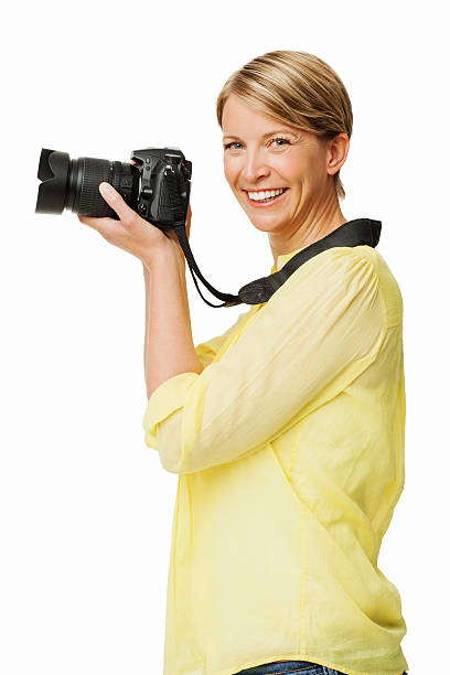 istock Beautiful Woman Holding SLR Camera 454325627