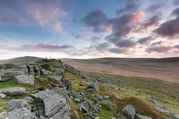 I was waiting for the sunset looking towards Oke Tor on Dartmoor when two walkers stood on top and made the image. The shot looks south towards the central wilderness.