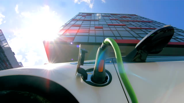 HD TIME LAPSE: Cloudscape Over An Electric Car