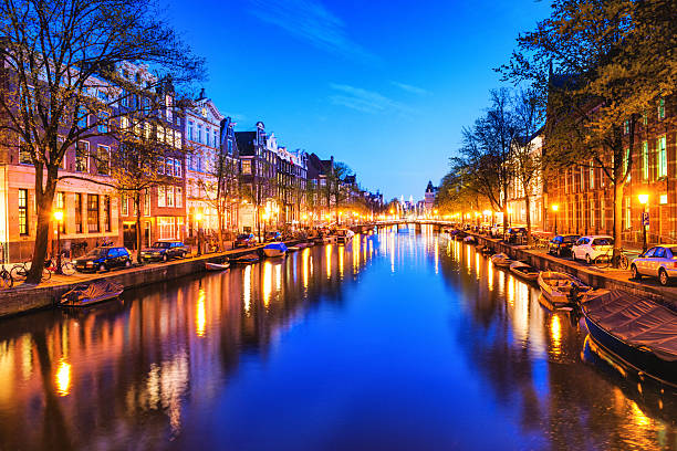 istock Amsterdam City Scene Water Canal at Night 454338599