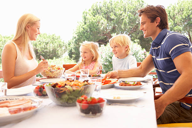 istock Parents, with children, enjoy a picnic 454340023