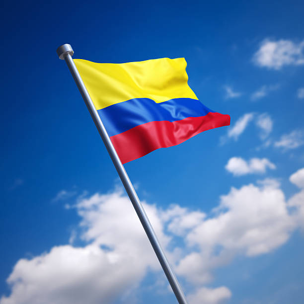 istock Flag of Colombia against blue sky 454341633