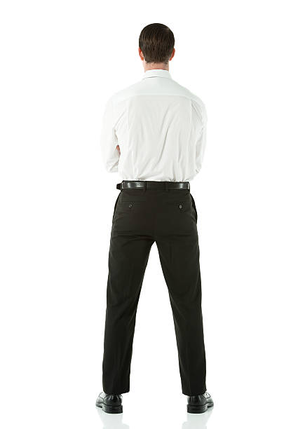 istock Rear view of a young businessman posing 454345083