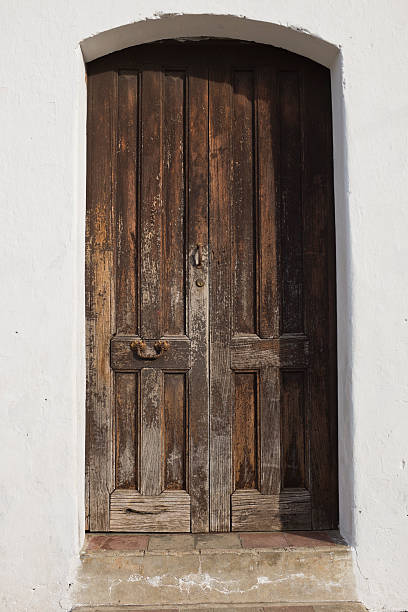 istock Old Weathered Salvadoran Door 454346097