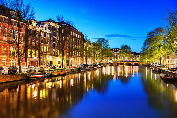 istock Amsterdam City Scene Water Canal at Night 454348097