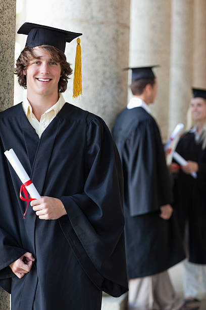 istock Happy student receiving his graduation 454353957