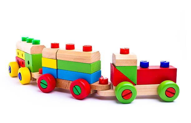 istock Colorful wooden toy train isolated on white background 454355659
