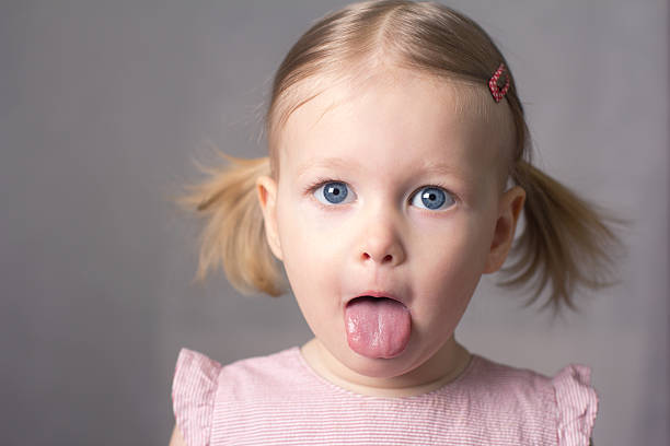 istock Little girl hamming 454357707