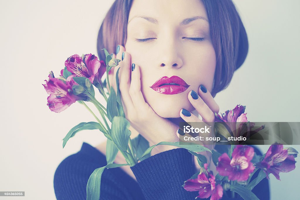 Beautiful lady with flowers Art portrait of beautiful young lady with delicate flowers 20-24 Years Stock Photo
