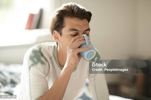 Energising For The Day Ahead Stock Photo - Download Image Now - 25-29 Years, Adult, Adults Only