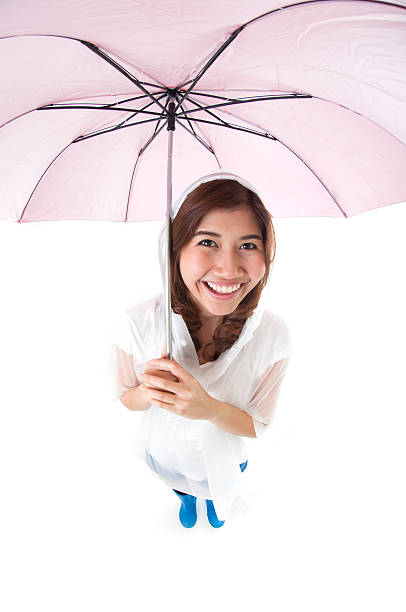 istock Young woman prepared for raining season. 454365533