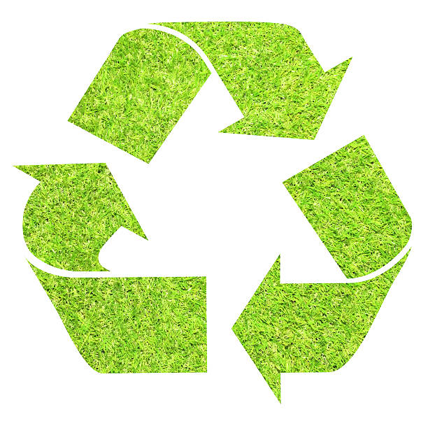 istock Recycling symbol in green grass. 454367093