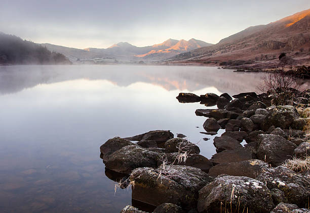 Lake Below Snowdon A misty start to a frosty January day at Capel Curig.  mount snowdon photos stock pictures, royalty-free photos & images