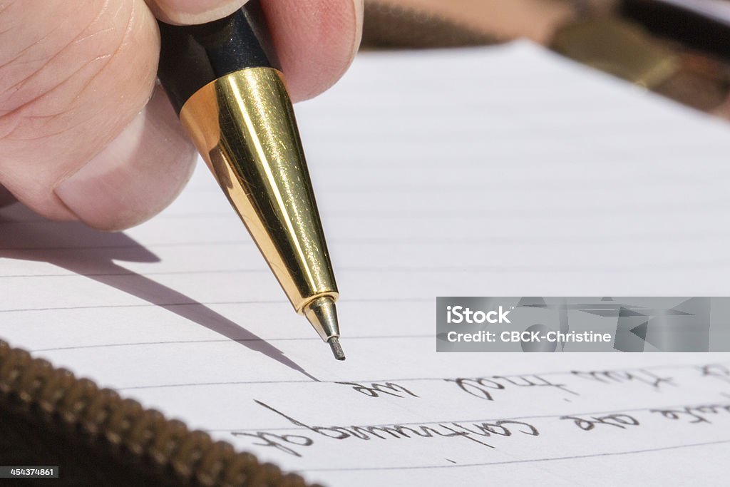 Writing with a mechanical pencil Writing with a mechanical metal pencil. Mechanical Pencil Stock Photo