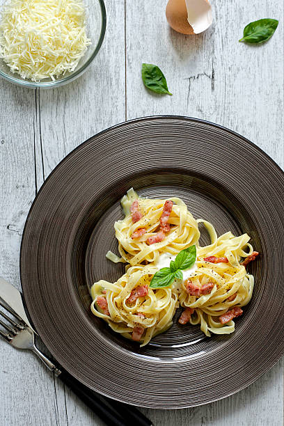 Tajiatelle carbonara stock photo