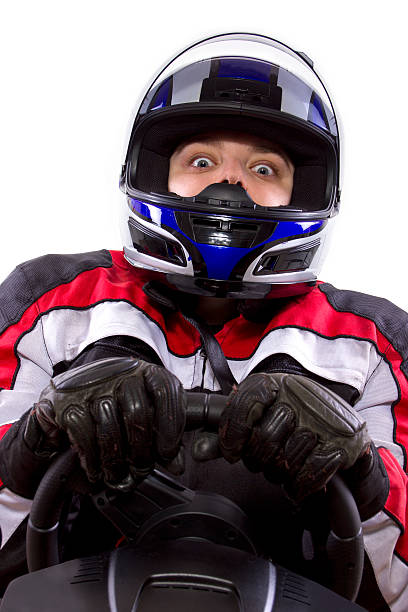 istock Female Racer Wearing a Helmet on a White Background 454378555
