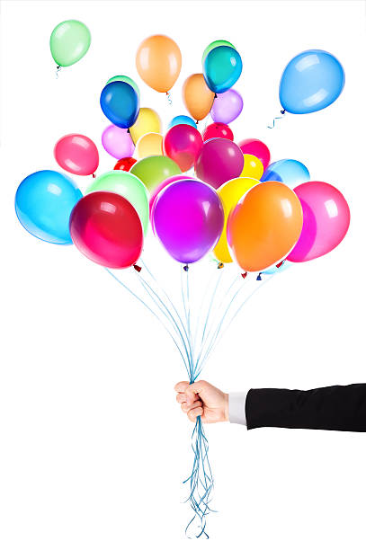 istock flying balloons with Businessman hand 454378779
