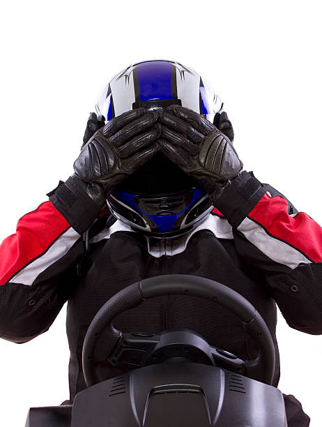 istock Racer Wearing a Helmet and Red Protective Gear 454378915