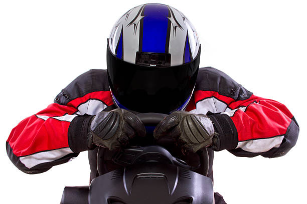 istock Racer Wearing a Helmet and Red Protective Gear 454378931