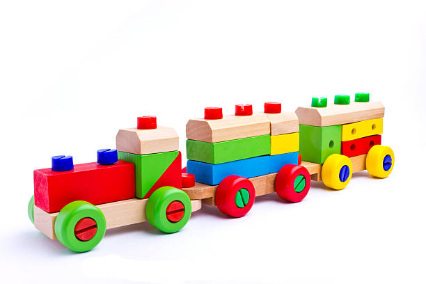 istock Colorful wooden toy train isolated on white background 454380819