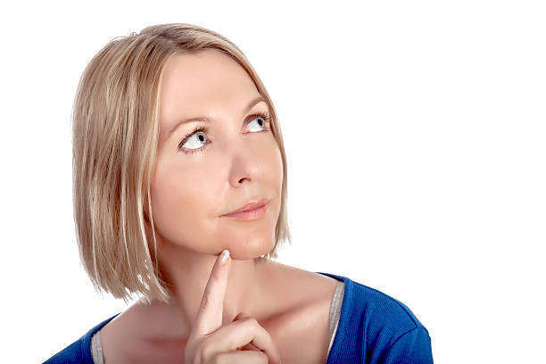 istock Beautiful young woman thinking 454380867