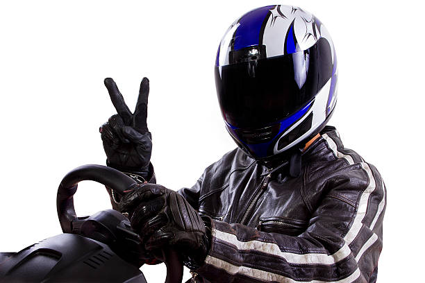 istock Racer Wearing a Helmet and Leather Protective Gear 454398181