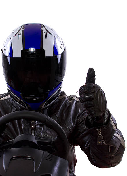 istock Man wearing helmet and leather jacket giving the thumbs up 454399435