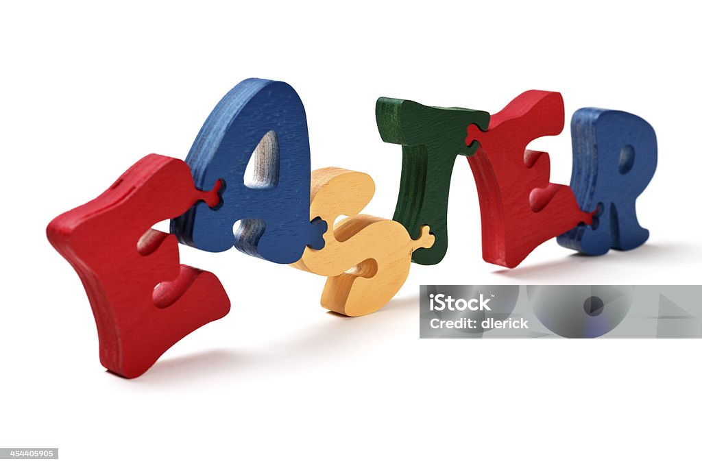 Easter: Puzzle Painted Wood Letters Single word EASTER  Jigsaw puzzle hand cut from wood and painted. Alphabet Stock Photo