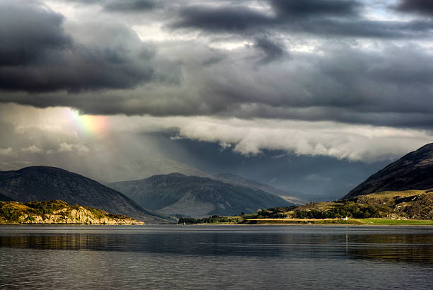 istock Storm clouds with rainbow, Loch Broom, Highlands, Ullapool. Highland, Scotland 454405995