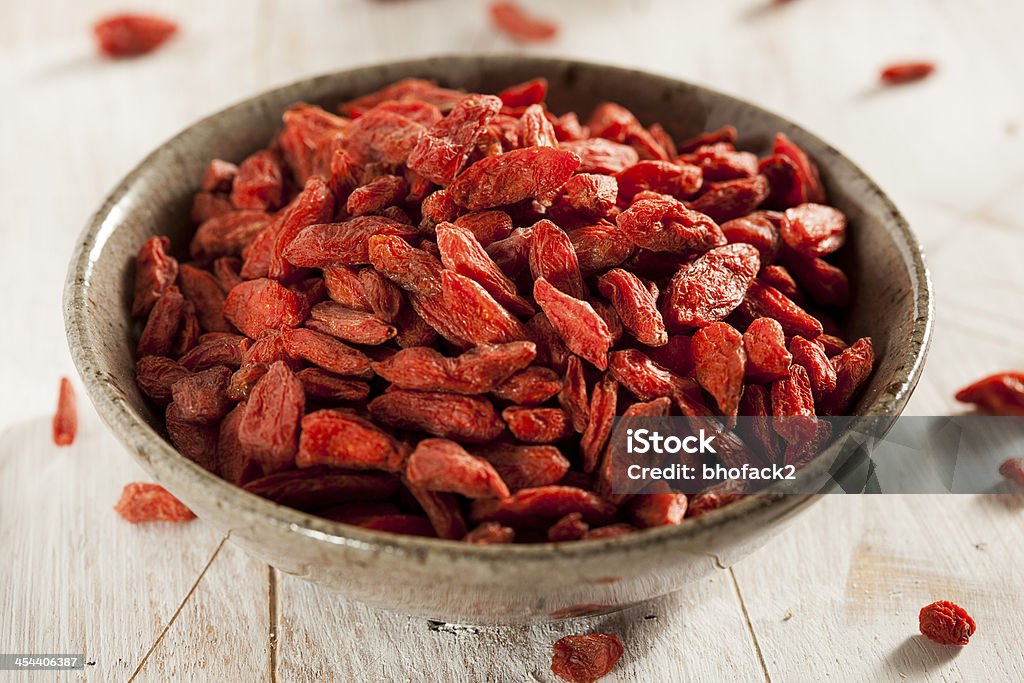 Organic Dried Goji Berries Organic Dried Goji Berries against a background Antioxidant Stock Photo